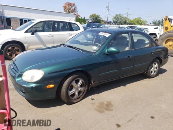 1999 Hyundai Sonata GLS with VIN KMHWF35V9XA100869, listed as a Copart auction lot 68219694 with 144,388 mi miles and Non repairable. Bid and sale history available at DreamBid. Image 1.