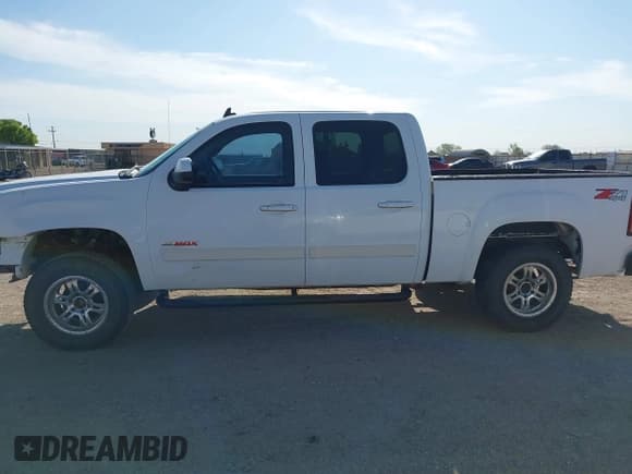 ✅ 2007 GMC Sierra 1500 • VIN: 3GTEK13Y17G517689 • Лот: 41996422. Опубликован ранее на IAAI с пробегом 209 240 миль. Бесплатный доступ к архиву аукционных продаж из США и подробный отчёт об истории автомобиля на DreamBid. Изображение 14.