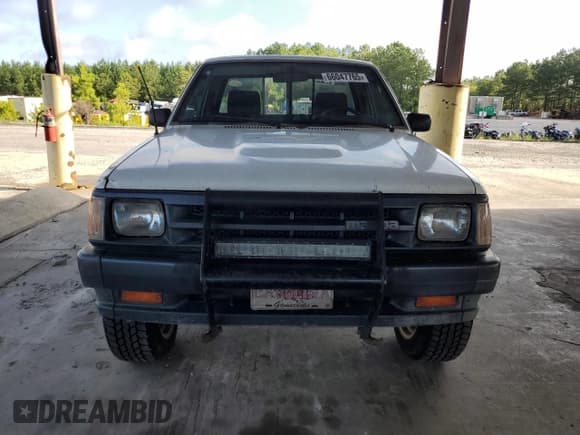 ✅ 1991 Mazda B-Series • VIN: JM2UF414XM0126845 • Lot: 66047765. Wystawiony na Copart z przebiegiem 125 531 mil. Bezpłatny archiwum sprzedaży aukcyjnych z USA i szczegółowy raport historii pojazdu na DreamBid. Zdjęcie 5.