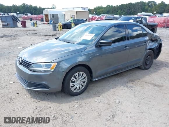 ✅ 2014 Volkswagen Jetta S • VIN: 3VW2K7AJ8EM308439 • Лот: 43218275. Опубликован ранее на IAAI с пробегом 127 463 миль. Бесплатный доступ к архиву аукционных продаж из США и подробный отчёт об истории автомобиля на DreamBid. Изображение 2.