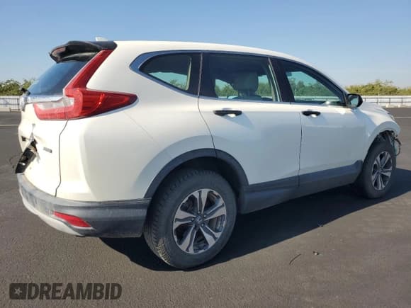✅ 2017 Honda CR-V LX • VIN: 2HKRW6H37HH207135 • Lot: 82682935. Wystawiony na Copart z przebiegiem 206 045 mil. Bezpłatny archiwum sprzedaży aukcyjnych z USA i szczegółowy raport historii pojazdu na DreamBid. Zdjęcie 3.