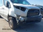 ✅ 2021 Ford Transit Cargo • VIN: 1FTBW3X88MKA61112 • Lot: 43350434. Wystawiony na IAAI z przebiegiem 57 141 mil. Bezpłatny archiwum sprzedaży aukcyjnych z USA i szczegółowy raport historii pojazdu na DreamBid. Zdjęcie 6.