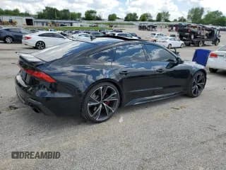 ✅ 2022 Audi RS 7 • VIN: WUAPCBF27NN905150 • Лот: 55993395. Опубликован ранее на Copart с пробегом 30 948 миль. Бесплатный доступ к архиву аукционных продаж из США и подробный отчёт об истории автомобиля на DreamBid. Изображение 3.