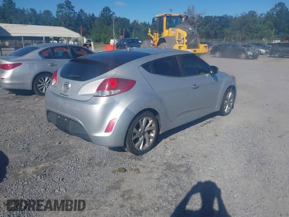 2016 Hyundai Veloster with VIN KMHTC6AD4GU274048, listed as a IAAI auction lot 43466510 with 103,456 mi miles and . Bid and sale history available at DreamBid. Image 4.