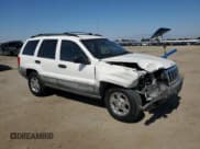 ✅ 1999 Jeep Grand Cherokee Laredo • VIN: 1J4G258S8XC735159 • Lot: 56247505. Wystawiony na Copart z przebiegiem 241 636 mil. Bezpłatny archiwum sprzedaży aukcyjnych z USA i szczegółowy raport historii pojazdu na DreamBid. Zdjęcie 4.