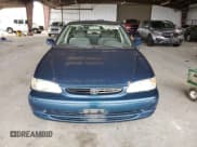 ✅ 1999 Toyota Corolla VE • VIN: 1NXBR12E9XZ157425 • Lot: 84708905. Listed on Copart with 144,175 mi. Free auction sales archive from the USA and detailed vehicle history report at DreamBid. Image 5.