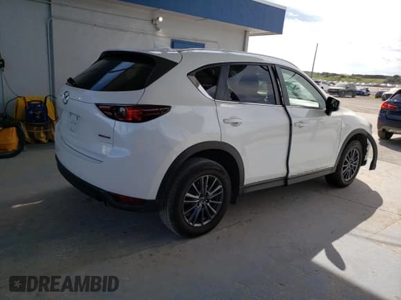 ✅ 2020 Mazda CX-5 Touring • VIN: JM3KFACM1L0826413 • Lot: 91128355. Wystawiony na Copart z przebiegiem 54 292 mil. Bezpłatny archiwum sprzedaży aukcyjnych z USA i szczegółowy raport historii pojazdu na DreamBid. Zdjęcie 3.