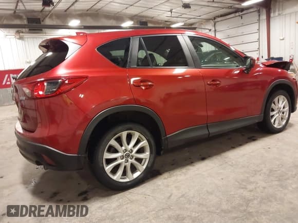 ✅ 2013 Mazda CX-5 Grand Touring • VIN: JM3KE4DE6D0159674 • Lot: 42674026. Wystawiony na IAAI z przebiegiem 127 206 mil. Bezpłatny archiwum sprzedaży aukcyjnych z USA i szczegółowy raport historii pojazdu na DreamBid. Zdjęcie 4.