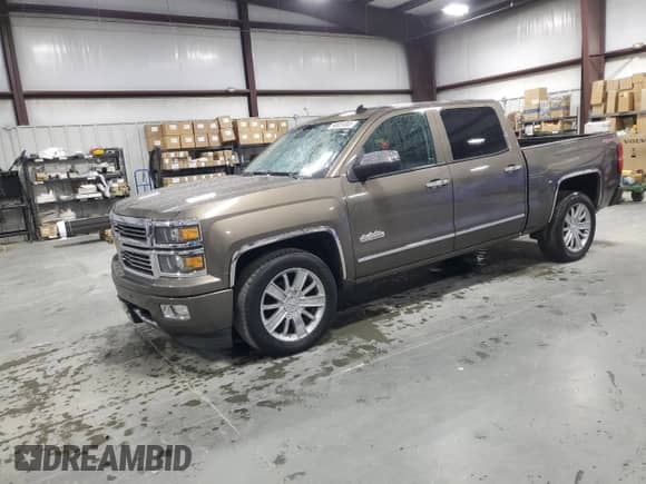 2014 Chevrolet Silverado 1500 High Country with VIN 3GCUKTEC3EG504349, listed as a Copart auction lot 90039305 with 184,901 mi miles and Clean title. Bid and sale history available at DreamBid. Image 1.