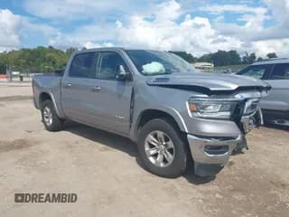 ✅ 2021 Ram 1500 Laramie • VIN: 1C6SRFJT0MN810027 • Lot: 43288083. Listed on IAAI with 73,882 mi. Free auction sales archive from the USA and detailed vehicle history report at DreamBid. Image 1.