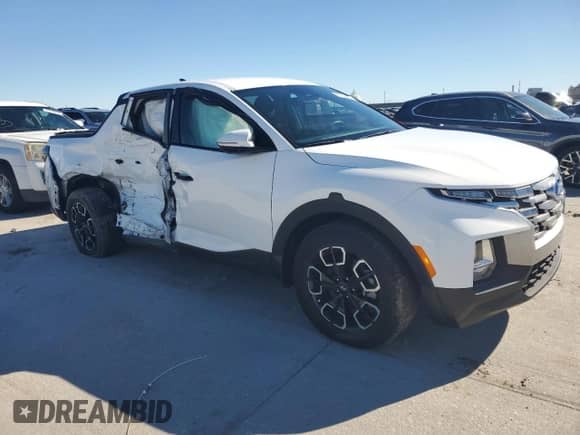 2022 Hyundai Santa Cruz SEL z VIN 5NTJBDAE3NH031402, wystawiony jako Copart lot #81236024 z przebiegiem 48 156 mil mil oraz Szkoda całkowita • Salvage title. Historia ofert i sprzedaży dostępna na DreamBid. Obrazek 4.