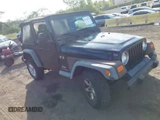 2004 Jeep Wrangler X with VIN 1J4FA39S84P761945, listed as a IAAI auction lot 43110629 with 153,239 mi miles and . Bid and sale history available at DreamBid. Image 1.