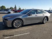 ✅ 2023 Toyota Mirai XLE • VIN: JTDAAAAA6PA007974 • Лот: 82754355. Опубликован ранее на Copart с пробегом 20 236 миль. Бесплатный доступ к архиву аукционных продаж из США и подробный отчёт об истории автомобиля на DreamBid. Изображение 1.