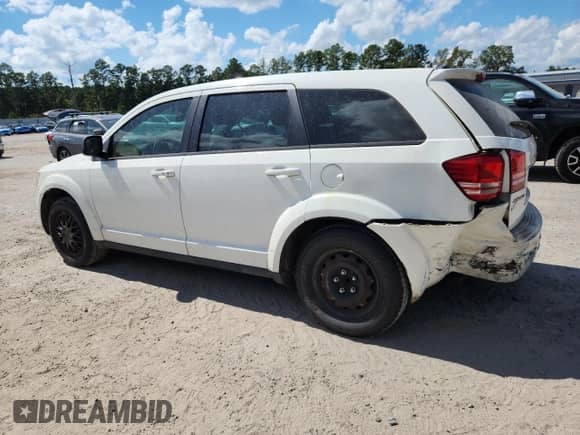 2012 Dodge Journey American Value z VIN 3C4PDCAB9CT353221, wystawiony jako Copart lot #83983955 z przebiegiem 312 681 mil mil oraz Szkoda całkowita • Salvage title. Historia ofert i sprzedaży dostępna na DreamBid. Obrazek 2.