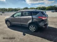 ✅ 2014 Ford Escape Titanium • VIN: 1FMCU0J99EUA85771 • Lot: 91504045. Listed on Copart with 131,245 mi. Free auction sales archive from the USA and detailed vehicle history report at DreamBid. Image 2.