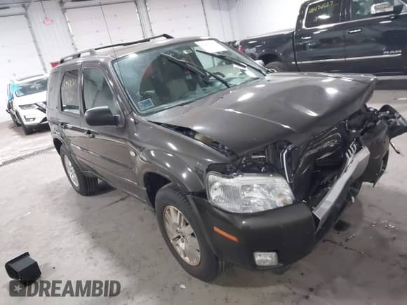 2006 Mercury Mariner Luxury z VIN 4M2CU56126KJ03006, wystawiony jako IAAI lot #42476543 z przebiegiem 114 288 mil mil oraz . Historia ofert i sprzedaży dostępna na DreamBid. Obrazek 1.