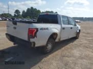 ✅ 2017 Ford F-150 XL • VIN: 1FTEW1EF6HKD01119 • Lot: 42756711. Listed on IAAI with 156,952 mi. Free auction sales archive from the USA and detailed vehicle history report at DreamBid. Image 4.