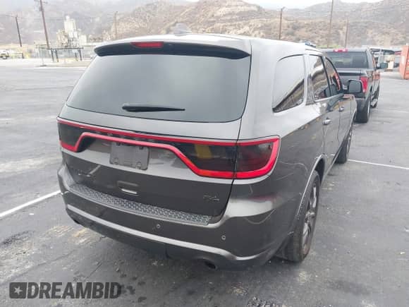 2018 Dodge Durango R/T with VIN 1C4SDHCT8JC100591, listed as a IAAI auction lot 43296025 with 95,326 mi miles and . Bid and sale history available at DreamBid. Image 4.
