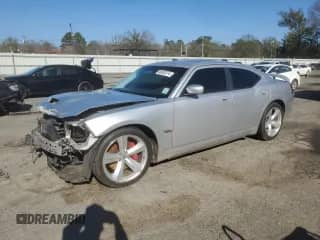 2009 Dodge Charger SRT-8 с VIN 2B3LA73W09H610039, выставлен на аукционе Copart как лот 86885314 с пробегом Не указан миль и Списание • Salvage title. История ставок и продаж доступна на DreamBid. Изображение 1.