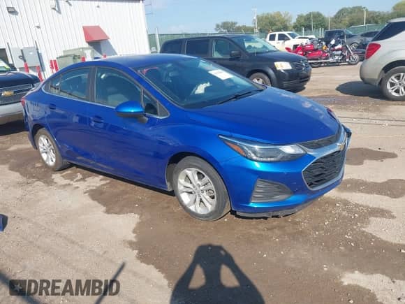 2019 Chevrolet Cruze LT with VIN 1G1BE5SM4K7108535, listed as a IAAI auction lot 43352905 with 102,584 mi miles and . Bid and sale history available at DreamBid. Image 1.