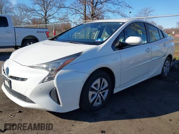 ✅ 2018 Toyota Prius Two • VIN: JTDKBRFU8J3066748 • Lot: 43765334. Listed on IAAI with 102,218 mi. Free auction sales archive from the USA and detailed vehicle history report at DreamBid. Image 2.