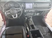 ✅ 2021 Jeep Wrangler Unlimited Sahara Altitude • VIN: 1C4HJXEM3MW762777 • Lot: 67072155. Listed on Copart with Not provided. Free auction sales archive from the USA and detailed vehicle history report at DreamBid. Image 8.