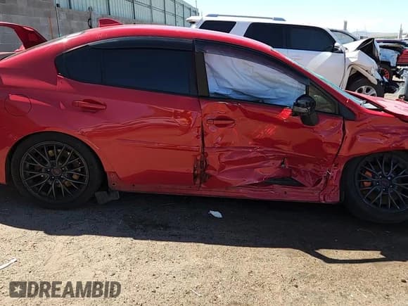 ✅ 2016 Subaru WRX STI • VIN: JF1VA2V64G9823912 • Lot: 71449475. Listed on Copart with 101,448 mi. Free auction sales archive from the USA and detailed vehicle history report at DreamBid. Image 13.