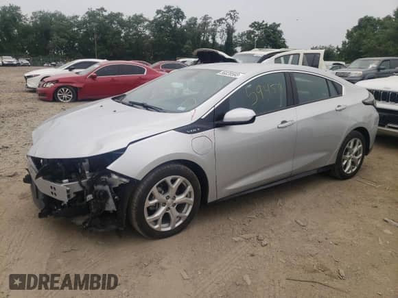 2017 Chevrolet Volt Premier z VIN 1G1RB6S5XHU107065, wystawiony jako Copart lot #56828593 z przebiegiem 59 459 mil mil oraz . Historia ofert i sprzedaży dostępna na DreamBid. Obrazek 1.