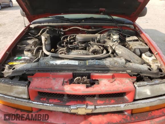 2003 Chevrolet Blazer LS z VIN 1GNDT13X83K135413, wystawiony jako Copart lot #71185894 z przebiegiem Nie podano mil oraz Szkoda całkowita • Salvage title. Historia ofert i sprzedaży dostępna na DreamBid. Obrazek 12.