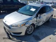 ✅ 2018 Ford Focus SE • VIN: 1FADP3F29JL273306 • Lot: 43341747. Listed on IAAI with 110,359 mi. Free auction sales archive from the USA and detailed vehicle history report at DreamBid. Image 6.