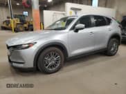 ✅ 2021 Mazda CX-5 Touring • VIN: JM3KFBCMXM0453623 • Lot: 90025385. Wystawiony na Copart z przebiegiem 83 246 mil. Bezpłatny archiwum sprzedaży aukcyjnych z USA i szczegółowy raport historii pojazdu na DreamBid. Zdjęcie 1.