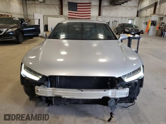 ✅ 2016 Audi A7 Premium Plus • VIN: WAUWGAFC0GN019722 • Lot: 89715215. Listed on Copart with 124,757 mi. Free auction sales archive from the USA and detailed vehicle history report at DreamBid. Image 5.