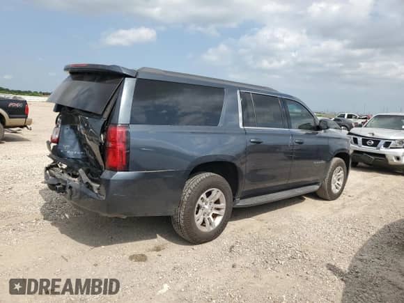 2020 Chevrolet Suburban LS z VIN 1GNSCGKCXLR106821, wystawiony jako Copart lot #55090365 z przebiegiem 109 347 mil mil oraz Szkoda całkowita • Salvage title. Historia ofert i sprzedaży dostępna na DreamBid. Obrazek 3.
