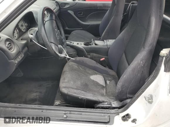 ✅ 2002 Mazda MX-5 Miata Cloth • VIN: JM1NB353X20222049 • Лот: 75404914. Опубликован ранее на Copart с пробегом Не указан. Бесплатный доступ к архиву аукционных продаж из США и подробный отчёт об истории автомобиля на DreamBid. Изображение 7.