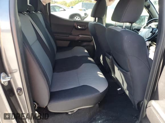 ✅ 2020 Toyota Tacoma TRD Off Road • VIN: 3TMCZ5AN2LM354887 • Лот: 82583485. Опубликован ранее на Copart с пробегом 52 899 миль. Бесплатный доступ к архиву аукционных продаж из США и подробный отчёт об истории автомобиля на DreamBid. Изображение 10.