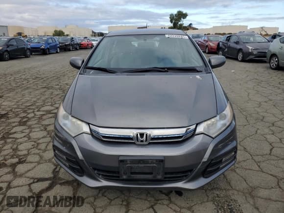 ✅ 2012 Honda Insight • VIN: JHMZE2H34CS005390 • Lot: 82239245. Listed on Copart with 104,017 mi. Free auction sales archive from the USA and detailed vehicle history report at DreamBid. Image 5.