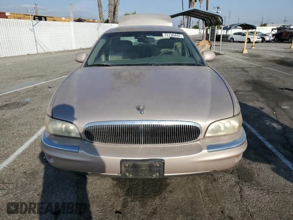 ✅ 1999 Buick Park Avenue • VIN: 1G4CW52K6X4653731 • Lot: 72736444. Wystawiony na Copart z przebiegiem 128 471 mil. Bezpłatny archiwum sprzedaży aukcyjnych z USA i szczegółowy raport historii pojazdu na DreamBid. Zdjęcie 5.