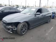 ✅ 2022 BMW 3 Series 330i • VIN: 3MW5R1J01N8C33802 • Lot: 41856666. Listed on IAAI with 41,095 mi. Free auction sales archive from the USA and detailed vehicle history report at DreamBid. Image 2.