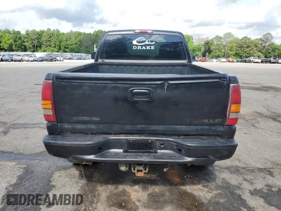 2002 Chevrolet Silverado 1500 LS with VIN 1GCEK14T72Z106860, listed as a Copart auction lot 54909765 with 301,431 mi miles and Salvage title. Bid and sale history available at DreamBid. Image 6.
