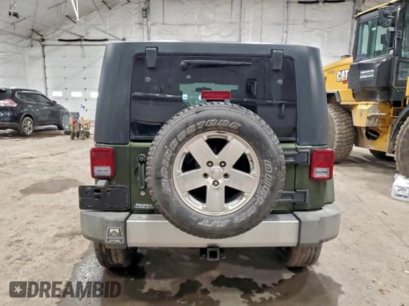✅ 2008 Jeep Wrangler Unlimited Sahara • VIN: 1J8GA59108L608334 • Lot: 94123835. Listed on Copart with 94,011 mi. Free auction sales archive from the USA and detailed vehicle history report at DreamBid. Image 6.