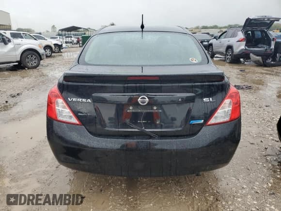 ✅ 2013 Nissan Versa S • VIN: 3N1CN7AP0DL828337 • Лот: 82079385. Опубликован ранее на Copart с пробегом Не указан. Бесплатный доступ к архиву аукционных продаж из США и подробный отчёт об истории автомобиля на DreamBid. Изображение 6.