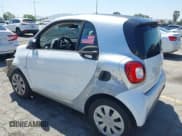✅ 2016 Smart fortwo Passion • VIN: WMEFJ5DA3GK143211 • Lot: 42287614. Listed on IAAI with 41,721 mi. Free auction sales archive from the USA and detailed vehicle history report at DreamBid. Image 3.