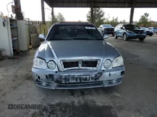 ✅ 2005 Kia Optima LX • VIN: KNAGD128X55420903 • Lot: 78411654. Wystawiony na Copart z przebiegiem 85 776 mil. Bezpłatny archiwum sprzedaży aukcyjnych z USA i szczegółowy raport historii pojazdu na DreamBid. Zdjęcie 5.