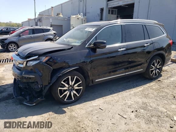 ✅ 2020 Honda Pilot Touring 7-Passenger • VIN: 5FNYF5H65LB009516 • Lot: 81001735. Listed on Copart with 66,757 mi. Free auction sales archive from the USA and detailed vehicle history report at DreamBid. Image 1.