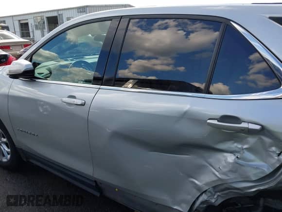 2019 Chevrolet Equinox LT with VIN 2GNAXUEV7K6274373, listed as a IAAI auction lot 43266888 with 129,076 mi miles and . Bid and sale history available at DreamBid. Image 14.