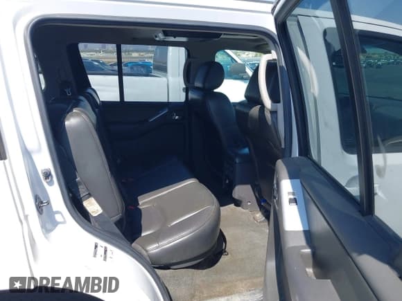 ✅ 2009 Nissan Pathfinder SE • VIN: 5N1AR18B59C605127 • Lot: 43005575. Listed on IAAI with 163,322 mi. Free auction sales archive from the USA and detailed vehicle history report at DreamBid. Image 8.