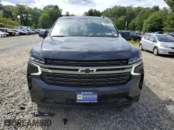 2022 Chevrolet Tahoe RST with VIN 1GNSKRKD0NR244846, listed as a Copart auction lot 70801855 with 69,403 mi miles and Salvage title. Bid and sale history available at DreamBid. Image 5.