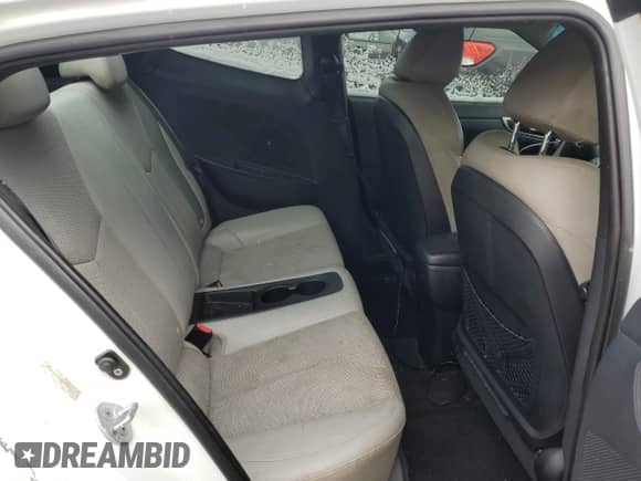 2012 Hyundai Veloster w/Red Int z VIN KMHTC6AD5CU030340, wystawiony jako Copart lot #45793405 z przebiegiem 139 667 mil mil oraz Czysty tytuł • Clean title. Historia ofert i sprzedaży dostępna na DreamBid. Obrazek 10.