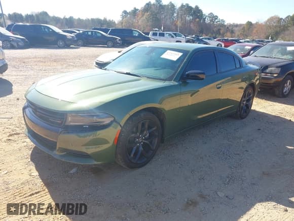 ✅ 2023 Dodge Charger SXT • VIN: 2C3CDXBG1PH592331 • Lot: 43713215. Listed on IAAI with 37,011 mi. Free auction sales archive from the USA and detailed vehicle history report at DreamBid. Image 2.
