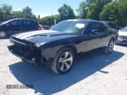 ✅ 2016 Dodge Challenger SXT • VIN: 2C3CDZAG4GH157638 • Lot: 43084001. Listed on IAAI with 163,658 mi. Free auction sales archive from the USA and detailed vehicle history report at DreamBid. Image 22.